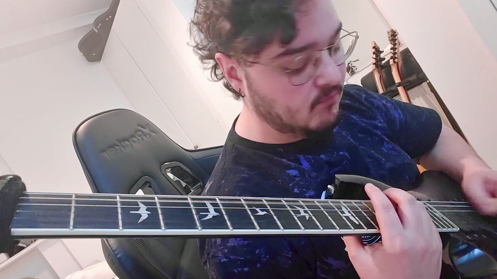 Pedro playing guitar